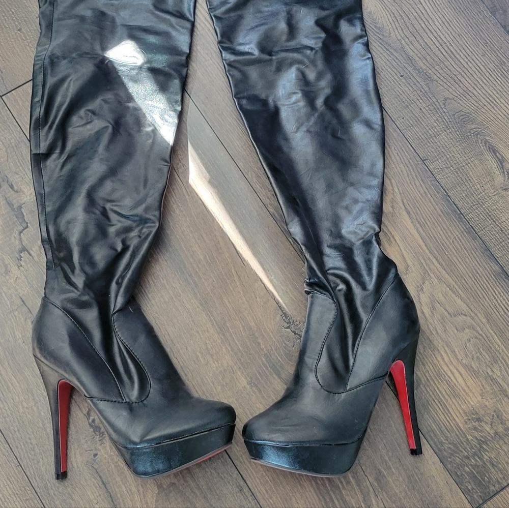 Thigh high black boots
